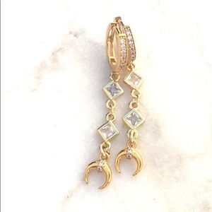 Gold hoop earrings with celestial zodiac moon charms